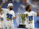 Los jugadores del Real Madrid Karim Benzemá (i) y Marcelo Vieira celebran el título de Liga, este sábado en el estadio Santiago Bernabéu. EFE/Mariscal