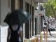 Una joven camina por una calle de Lleida, bajo un termómetro que indica los 47ºC. EFE/ Ramon Gabriel