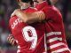 El delantero del Girona Christian Stuani (d) celebra con Valentín Castellano tras marcar ante el Getafe, durante el partido de Liga en Primera División que disputan este lunes en el estadio municipal de Montilivi. EFE/David Borrat