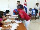 Votantes participan en los comicios locales de los delegados (concejales) de barrio, hoy, en La Habana (Cuba). EFE/Ernesto Mastrascusa