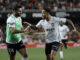 Los jugadores del Valencia, el neerlandés Justin Kluivert (d) y el suizo Eray Comert, celebran el primer gol del equipo valencianista durante el partido correspondiente a la jornada 25 de primera división que disputaron Valencia y Osasuna en el estadio Mestalla de Valencia. EFE/ Juan Carlos Cárdenas