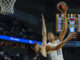 El pivot caboverdiano del Real Madrid, Walter Tavares (d), lanza ante la defensa del jugador serbio del Girona, Dusan Miletic, durante el encuentro correspondiente a la fase regular de la Liga Endesa disputado en el Wizink Center de Madrid. EFE / Juanjo Martín.