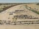Imagen aérea captada este jueves, 11 de mayo, en la que se registró a cientos de migrantes mientras esperan junto al muro fronterizo en El Paso (Texas, EE.UU.). EFE/Jonathan Fernández