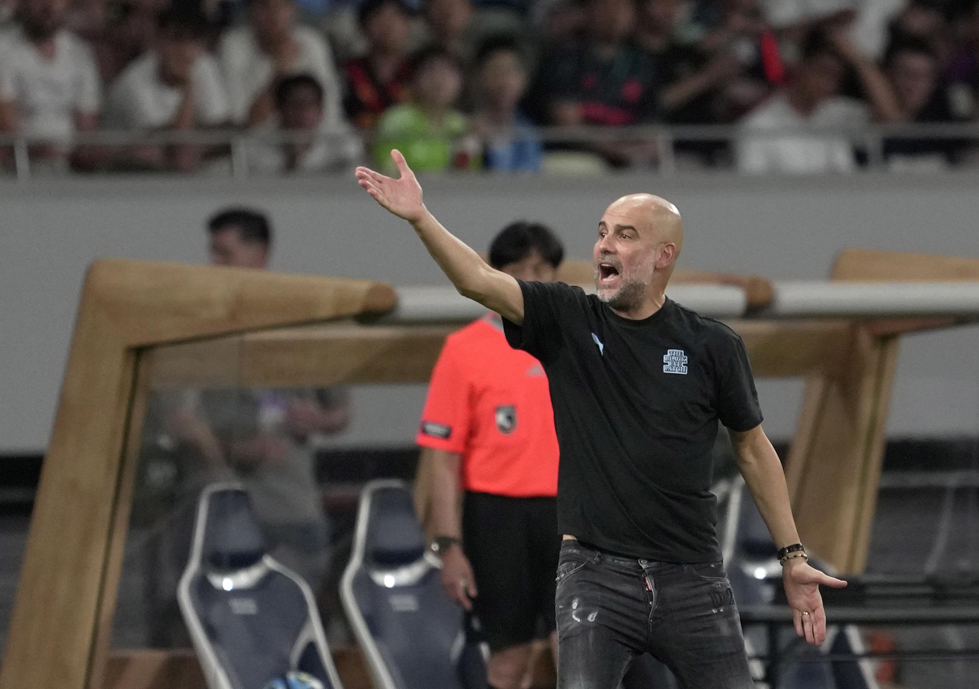 El entrenador del Manchester City, Pep Guardiola.EFE/EPA/KIMIMASA MAYAMA
