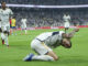 El delantero del Real Madrid Joselu Sanmartín celebra tras anotar el 2-0 durante el encuentro de la jornada 7 de LaLiga EA Sports entre el Real Madrid y la UD Las Palmas en el Estadio Santiago Bernabéu, este miércoles en Madrid. EFE/ Kiko Huesca.