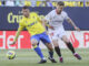 El defensa del Cádiz, Rubén Alcaraz (i), disputa el balón ante el centrocampista croata del Sevilla, Ivan Rakitic, en una foto de archivo. EFE/Román Ríos.