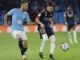 Imagen de archivo en la que el lateral del Real Madrid Fran García (d) juega un balón ante Óscar Mingueza, del Celta, durante el partido de la tercera jornada de LaLiga que enfrentó al Celta de Vigo y al Real Madrid en el estadio de Balaídos, en Vigo. EFE/Salvador Sas