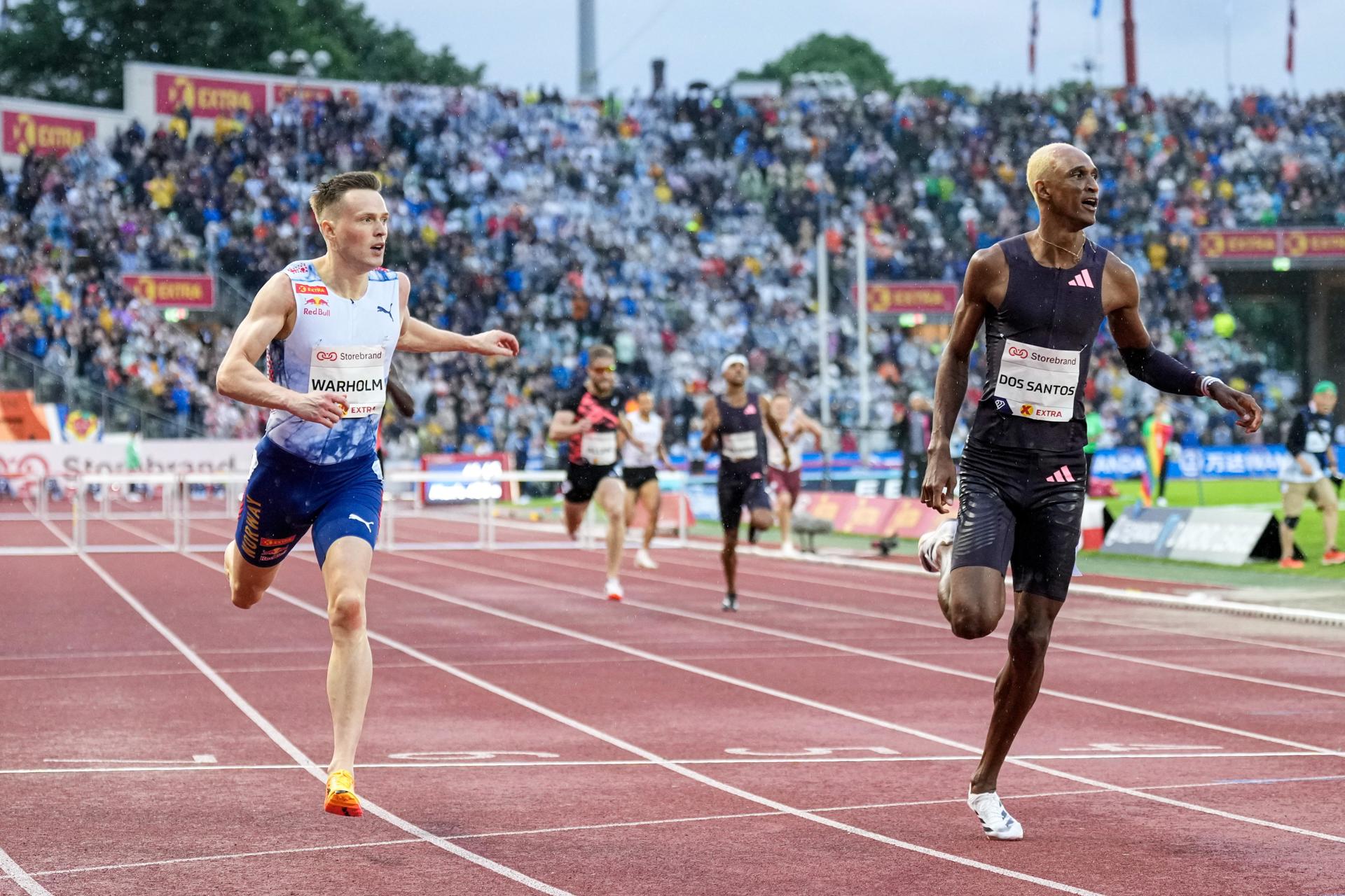 Karsten Warholm y Alison Dos Santos. EFE/EPA/Heiko Junge
