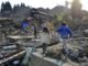 Varios niños supervivientes del tsunami de 2011 juegan en una zona arrasada de la localidad de Kesennuma, prefectura de Miyagi (Japón). Archivo EFE/Kimimasa Mayama