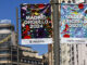 Carteles del Orgullo 2024 del Ayuntamiento de Madrid, en la calle Gran Vía, de Madrid. EFE/ Chema Moya
