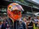 El piloto de Red Bull Racing Max Verstappen camina en la parrilla de salida antes del Gran Premio de Austria de Fórmula uno, en Spielberg, Austria. EFE/EPA/MARTÍN DIVISEK