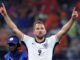 El jugador inglés Harry Kane celebra tras ganar la semifinal de la Eurocopa 2024 entre Holanda e Inglaterra, en Dortmund, Alemania. EFE/EPA/CHRISTOPHER NEUNDORF