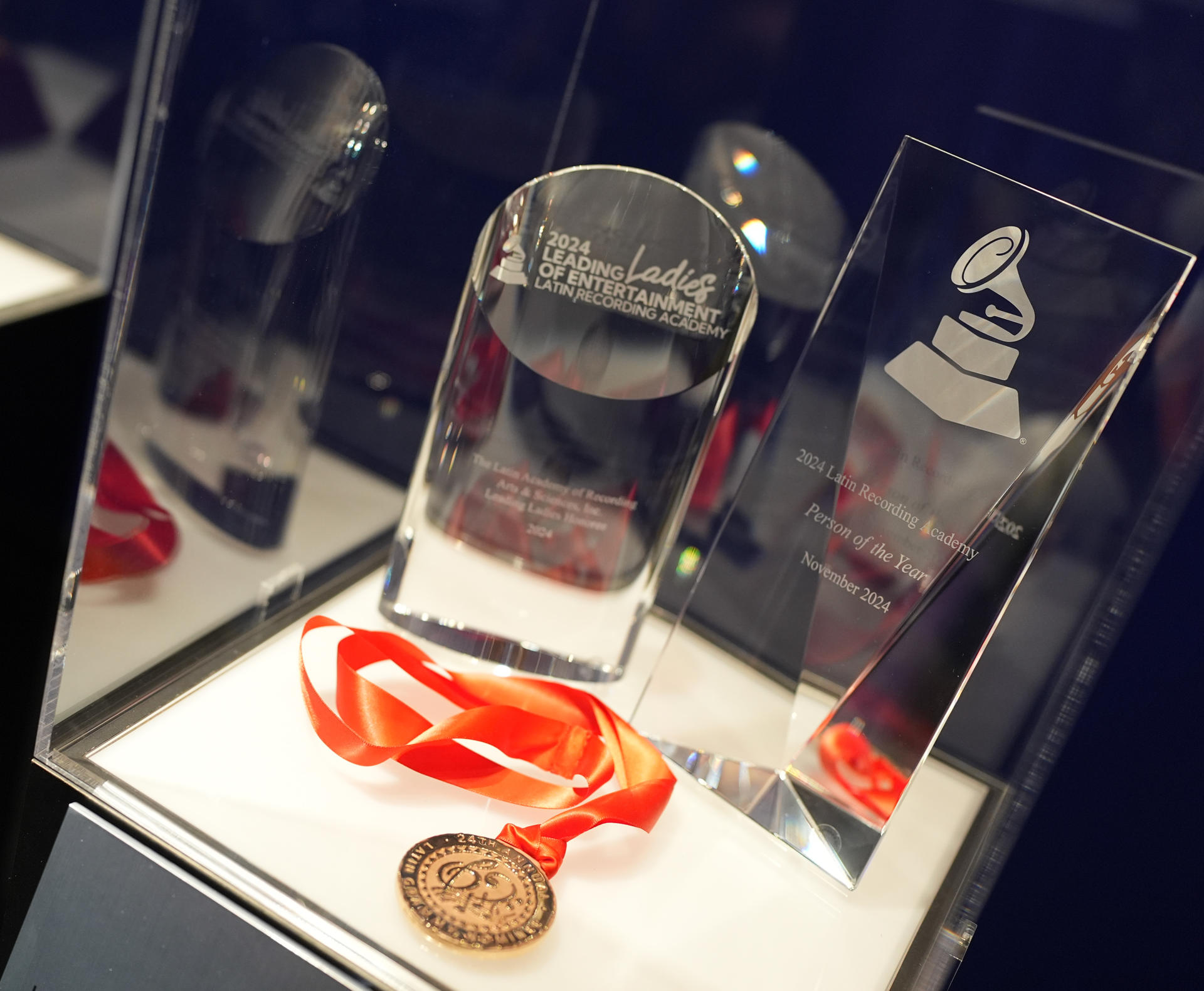 Fotografía cedida de varios galardones de los Grammy Latinos en la exposición 'Los Latin Grammys: 25 años de excelencia musical'. EFE/The Paley Center for Media
