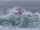 La puertorriqueña Havanna Cabrero compite durante la final de la edición 38 del Corona Pro Surf Circuit en la playa Middles, en Isabela (Puerto Rico). EFE/ Thais Llorca