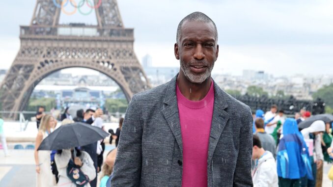 El exvelocista estadounidense Michael Johnson durante los Juegos de París 2024. EFE/EPA/CHRISTOPHE PETIT TESSON / POOL
