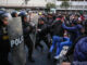 Manifestantes y miembros de la Policía se enfrentan durante una protesta este jueves, en Lima (Perú). EFE/ STR