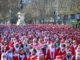 Miles de corredores vestidos de Papá Noel participan en esta tradicional Carrera de Navidad, que alcanza este año su XIII edición, en Madrid. EFE/Víctor Lerena