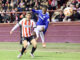 El delantero del Athletic Club, Nico Williams (d), disputa el balón ante el defensor del Logroñés durante el partido de dieciseisavos de Copa del Rey que disputaron en el Estadio Las Gaunas de Logroño. EFE/ Raquel Manzanares.