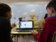 Dos niños manejan un robot por ordenador en el CRA (Colegio Rural Agrupado) Riberduero, ubicado en la localidad burgalesa de Villalba de Duero. EFE/ Paco Santamaria