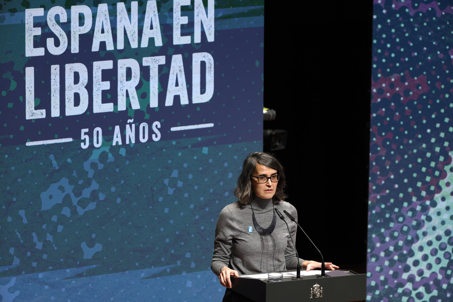 La recién nombrada comisionada para los actos del 50 aniversario de la muerte de Francisco Franco, Carmina Gustrán, interviene en el primer acto celebrado con motivo de la citada efemérides y el inicio del proceso hacia la democracia, este miércoles en Madrid. EFE/ JuanJo Martín
