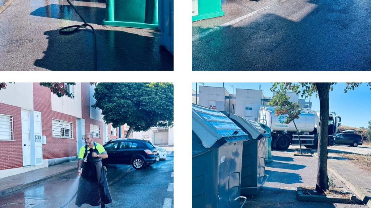 Operarios del Ayuntamiento de Cáceres realizando limpieza y baldeo de la calle Sierra de la Mosca en el barrio de La Cañada
