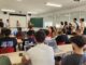 Aula universitaria con estudiantes durante una presentación en el Campus de la Universidad de Extremadura en Cáceres