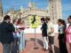 Caballo negro en silueta sobre fondo amarillo, cartel anunciador de eventos en Montellano