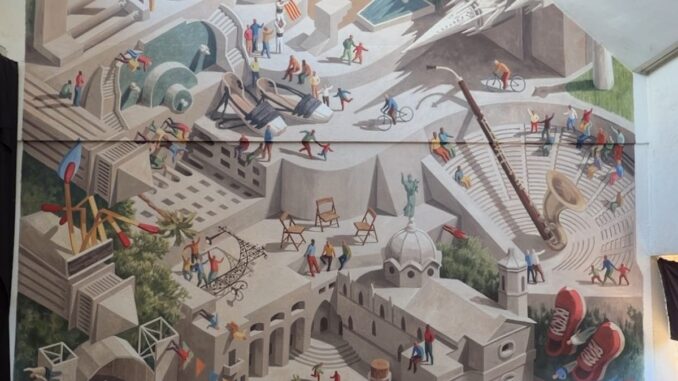 Cinta Vidal plasma el cartel de la Mercè en un mural de 33 m² en la Biblioteca La Marina Mural de 33 metros cuadrados del cartel de la Mercè pintado por Cinta Vidal en la Biblioteca La Marina de Barcelona