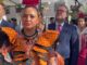 Procesión de San Miguel en Torremolinos con participantes en celebración tradicional