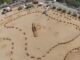 Vista aérea del circuito del desafío automovilístico de Villaviciosa de Odón con participantes en competición